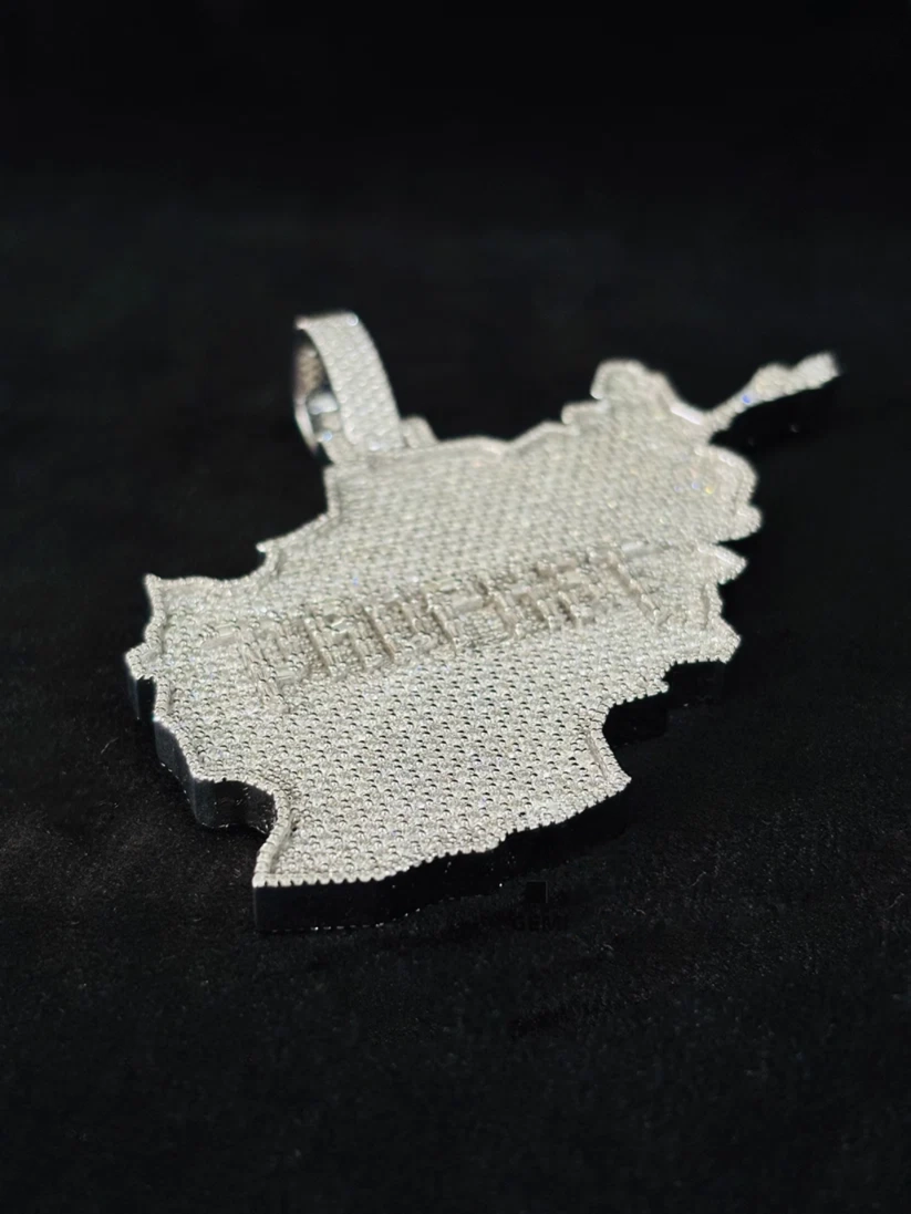 Iced-out Afghanistan map pendant necklace in silver studded with pavé moissanite stones.