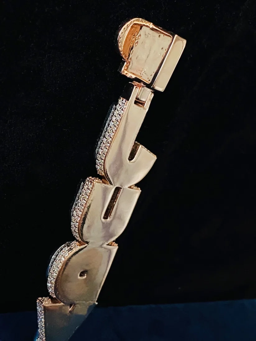 Vertical gold custom name pendant with iced-out diamond block letters
