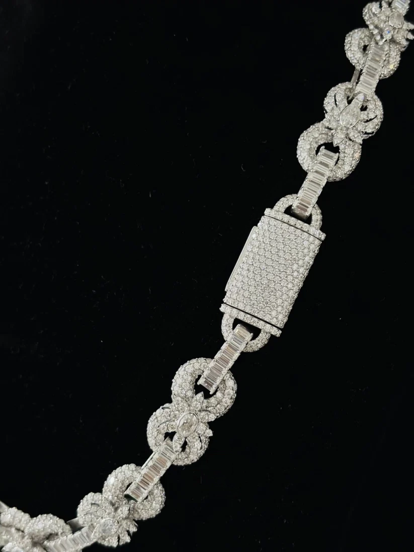 White gold diamond link chain necklace with a pave diamond pave rectangle clasp 