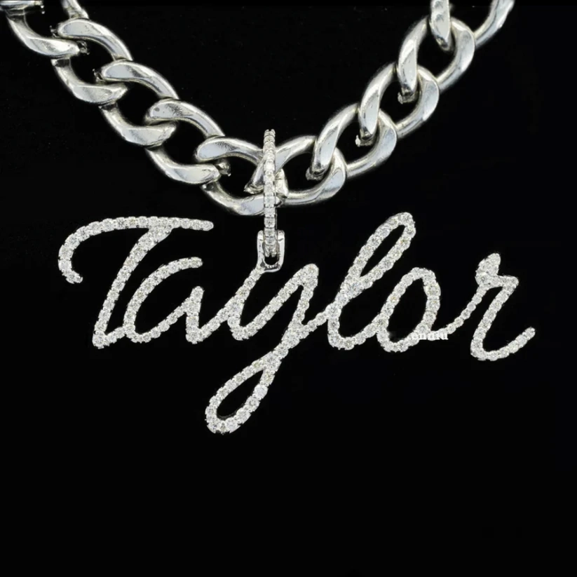 front view Silver chain necklace with 'Taylor' pendant on a black background
