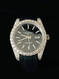 Luxury Rolex Date just wristwatch featuring a diamond-encrusted case and rubber band