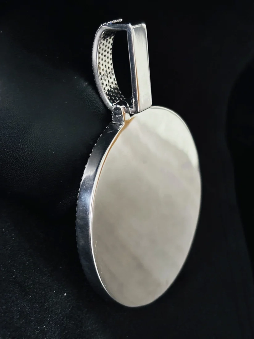 Custom round memory picture pendant necklace in silver with paved stone bail.