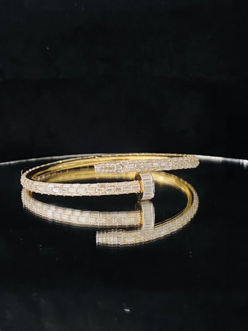 A front view Luxury baguette diamond nail bangle bracelet in silver 