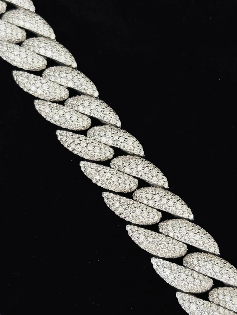 Close-up view Silver iced out Cuban link bracelet with Moissanite stones