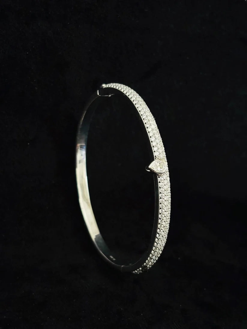 Silver pave diamond hinged bangle bracelet with heart clasp accent