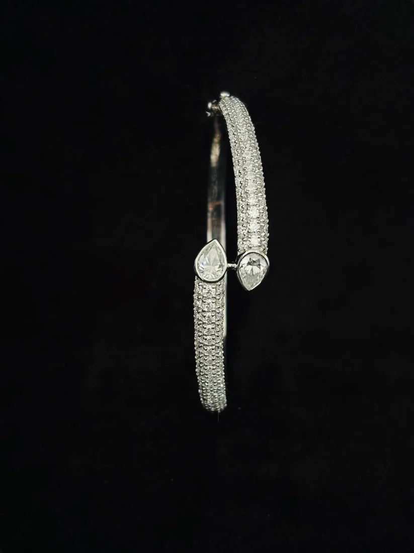 silver hinged bangle bracelet a curved band encrusted with shimmering pave set