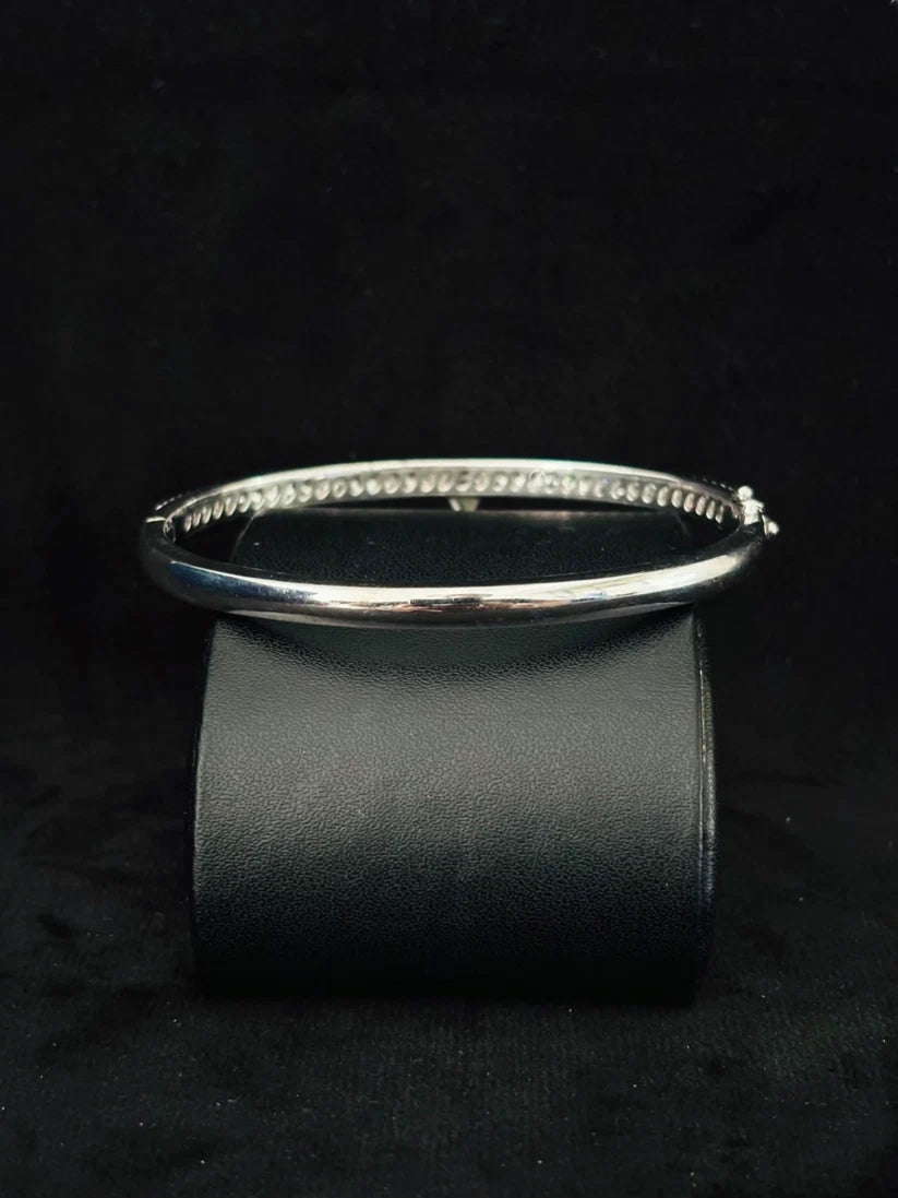 Back view Elegant silver-toned rigid bangle bracelet For Her