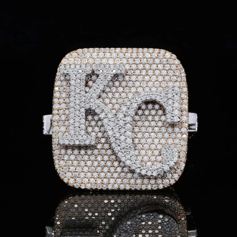 close up of a Custom diamond KC initial ring 