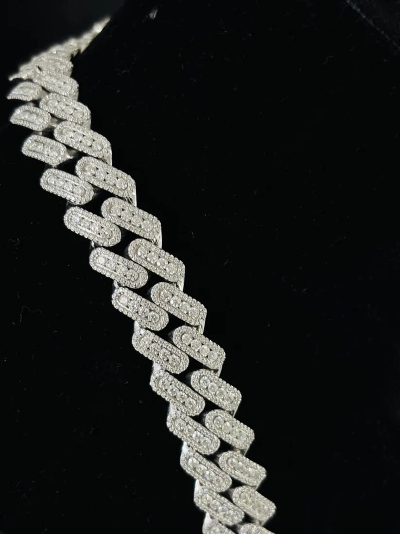 Diamond-encrusted white gold Cuban link chain 