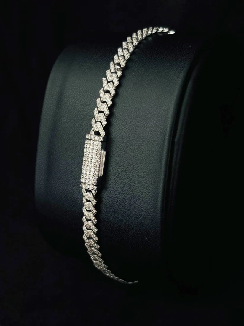 Men's iced silver Cuban link bracelet featuring rhinestone prong-set links