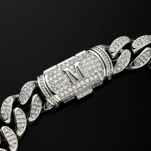 Iced-out Cuban link chain bracelet with diamond pave initial M clasp