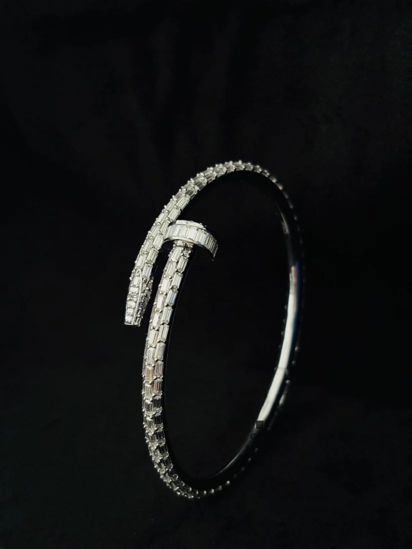 Modern silver hip hop jewelry nail cuff bracelet with baguette diamonds