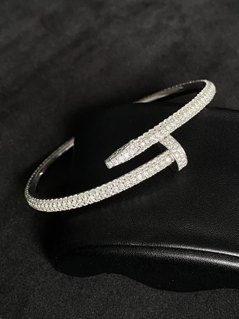 Iced out nail cuff bangle bracelet in silver with pave diamond accents