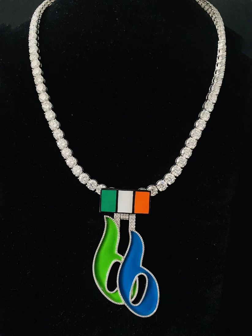 front view Silver tennis chain necklace with a custom tricolor flag pendant and green and blue enamel 66 numbers.