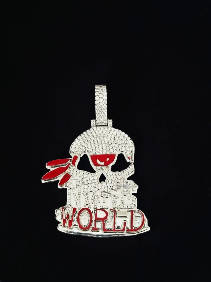 Iced out skull pendant with red WORLD lettering