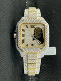 front view Gold and silver diamond-iced watch featuring a Jesus piece portrait dial and Roman numerals