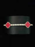 925 Sterling Silver Red Clover Moissanite Tennis Bracelet on Black Display