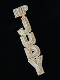 front view Custom iced out vertical RIP Judy name pendant in gold and pavé diamonds