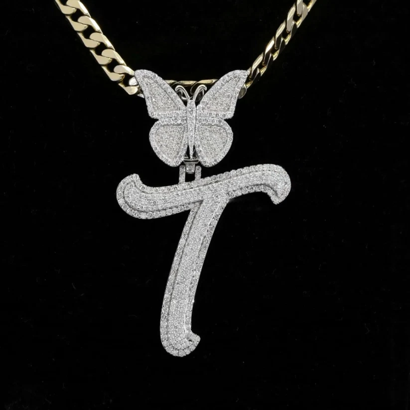front view Silver diamond initial T necklace with butterfly accent.
