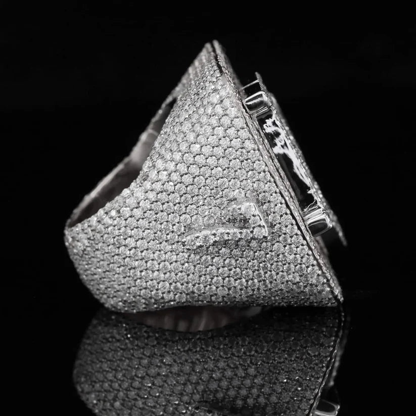 Custom iced-out hip hop ring with pave diamond setting, side profile.