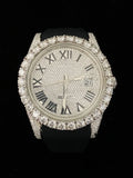 front view Fully iced-out custom Datejust luxury watch with a diamond-pave Roman numeral dial and a black silicone strap.
