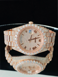 front side Fully iced-out men's rose gold diamond watch on reflective background
