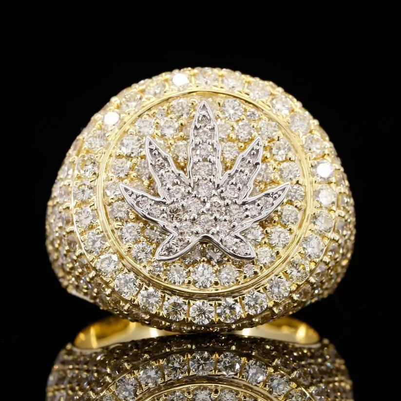front view of the Diamond cannabis leaf pinky ring in yellow gold plated 