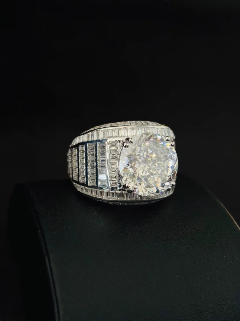 Front view profile view of a luxury iced-out diamond wedding band with a massive center stone ring for women