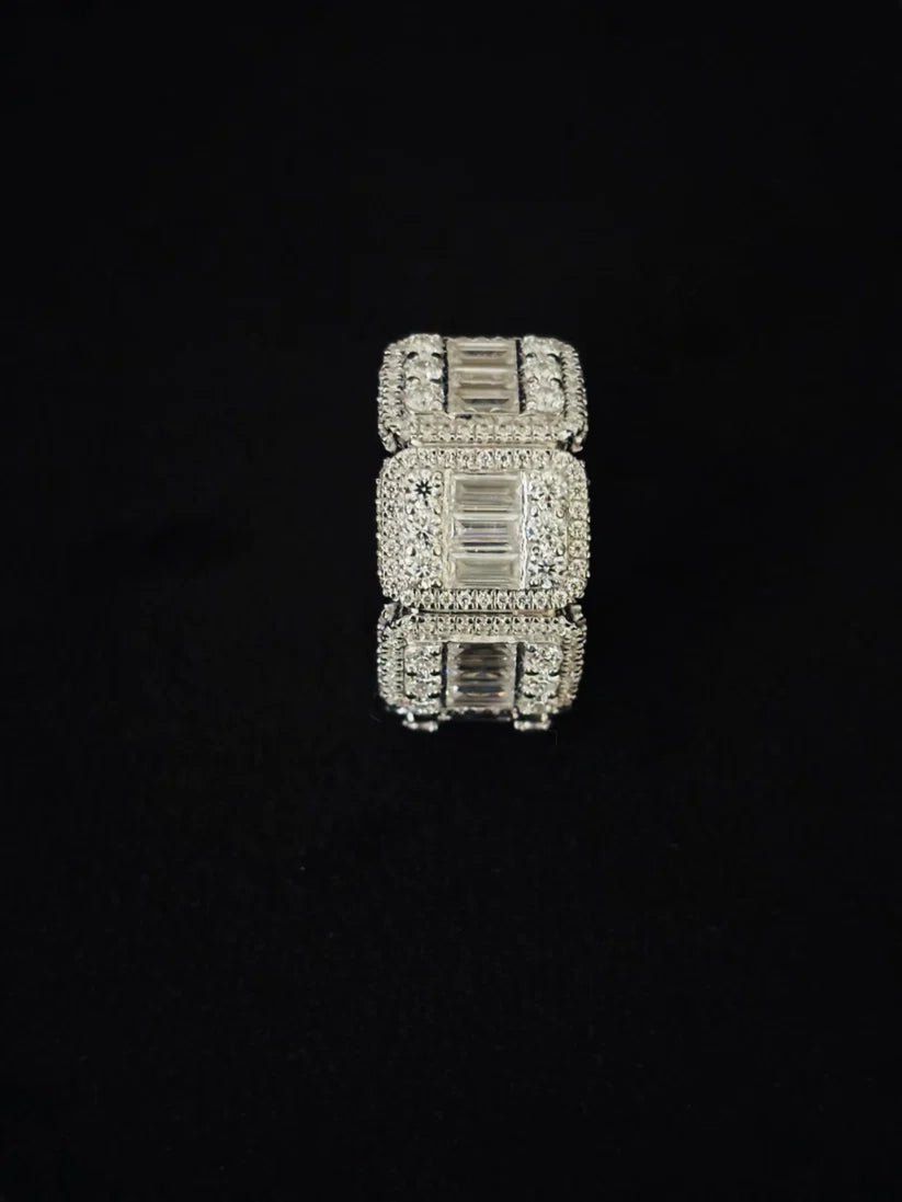 Side view Men's wide diamond ring featuring baguette cut center stones and iced pave borders