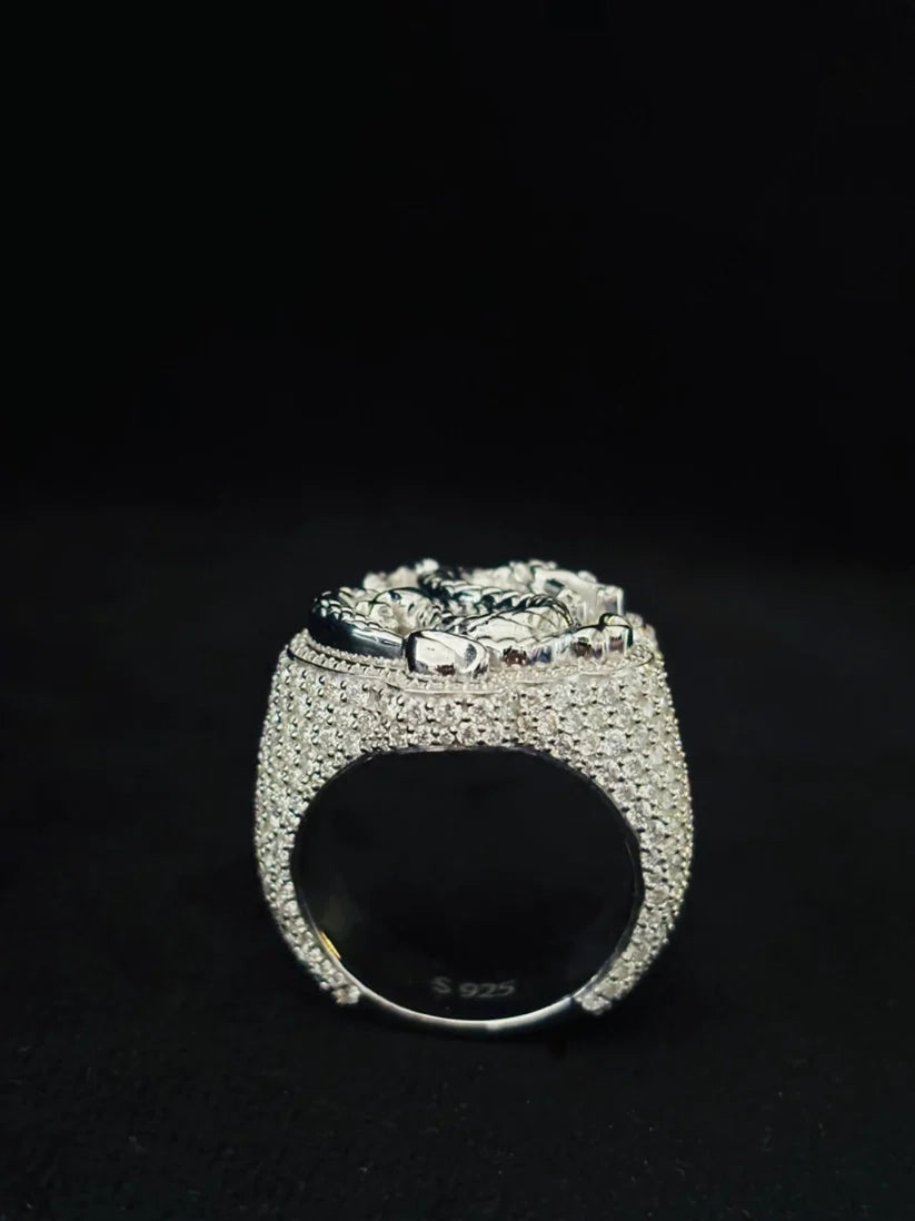 Chunky iced-out silver ring featuring a smooth sizing bar and micro-pave diamond accents