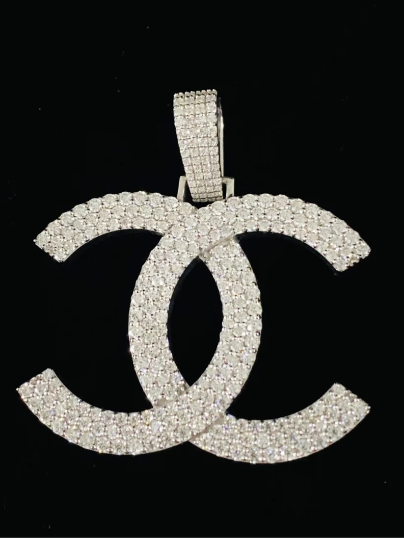 front view ced out interlocking double C logo pendant necklace charm in silver tone with white pavé diamonds.