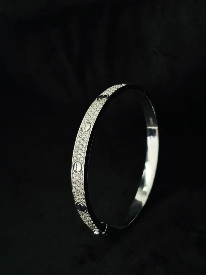 Pave diamond paved screw motif silver bangle bracelet