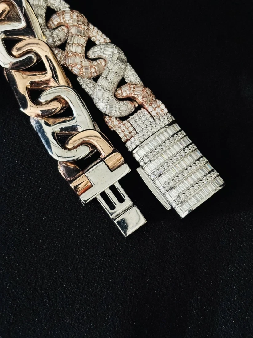 Iced out two-tone Cuban link bracelet with baguette stones