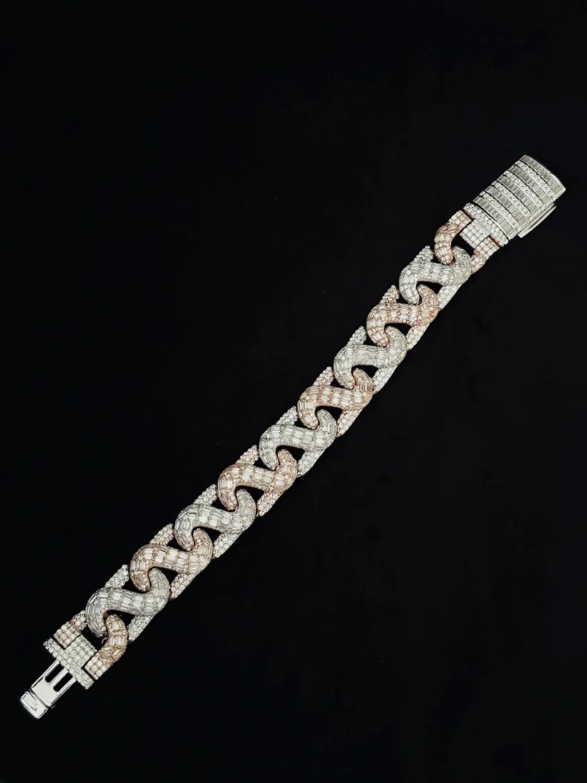 Two-tone iced out Miami Cuban link bracelet with a baguette diamond box clasp
