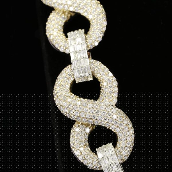side view of the Diamond encrusted infinity link chain necklace in yellow gold