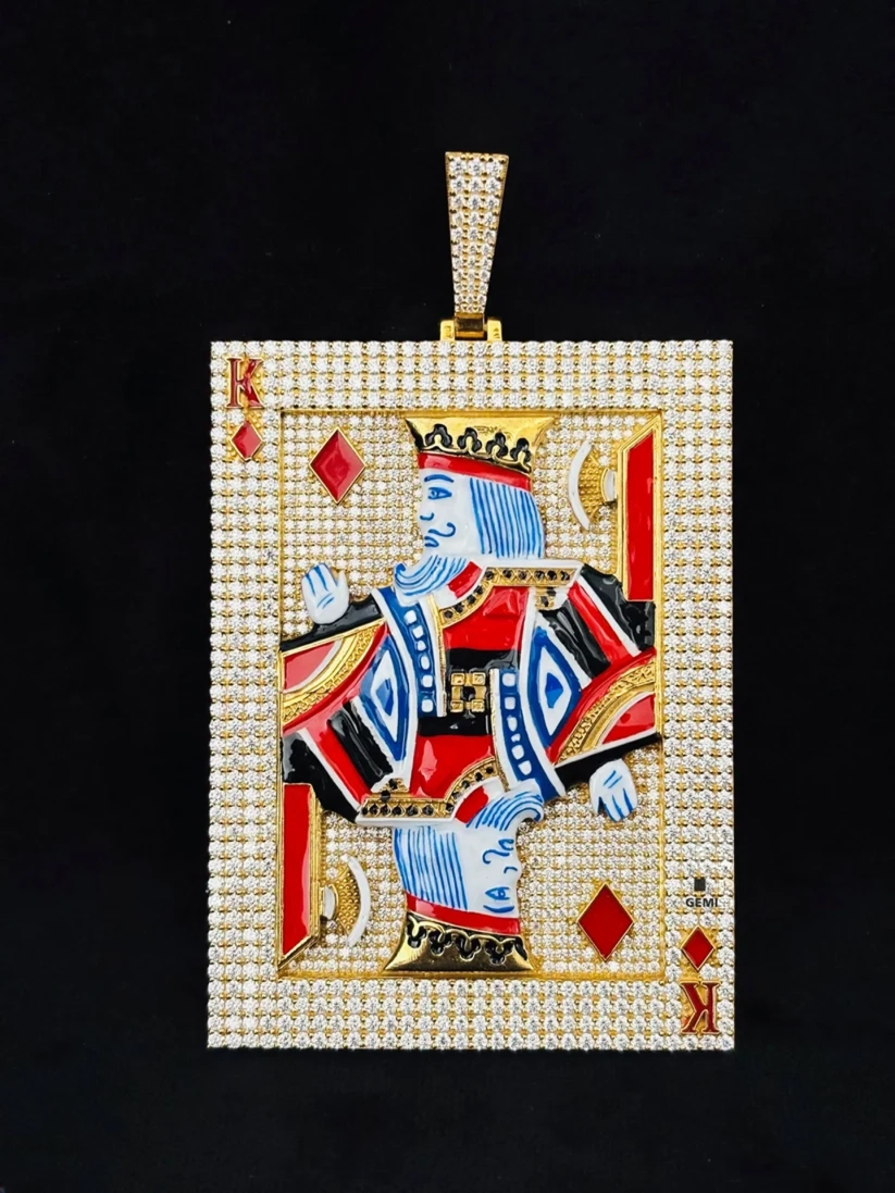 front view Iced out King of Diamonds playing card pendant in yellow gold with moissanite diamonds and colorful enamel.