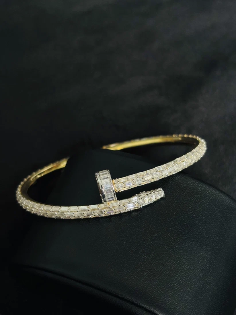 Modern silver hip hop jewelry nail cuff bracelet with baguette diamonds