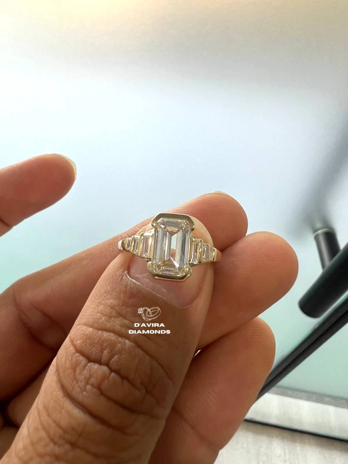Half Bezel Set Emerald Cut Lab Engagement Ring