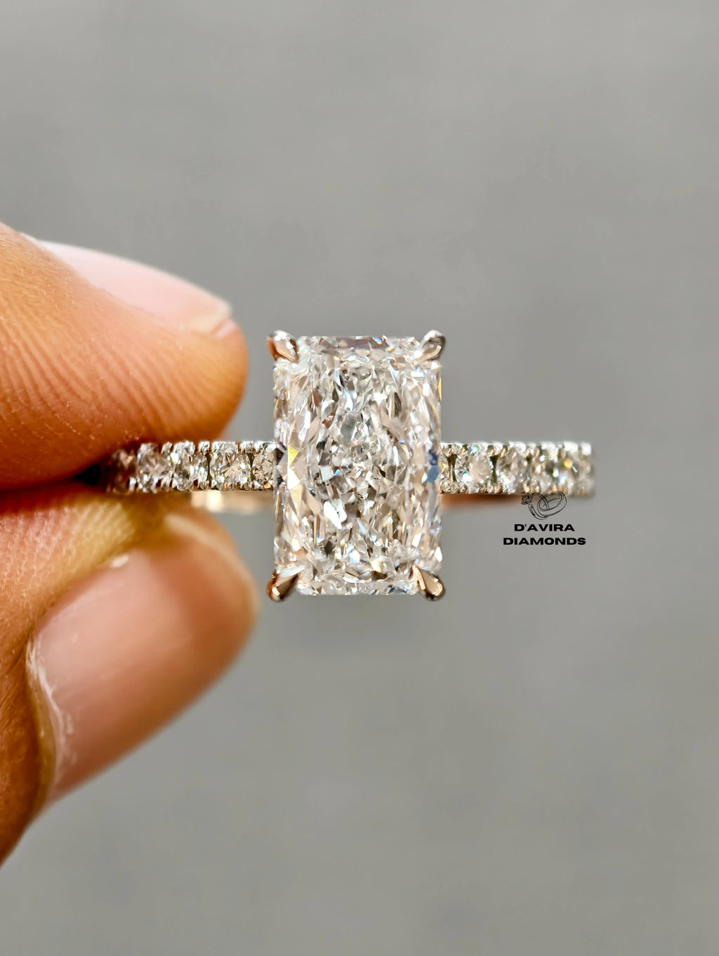 front view of the emerald Cut with pave set ring 