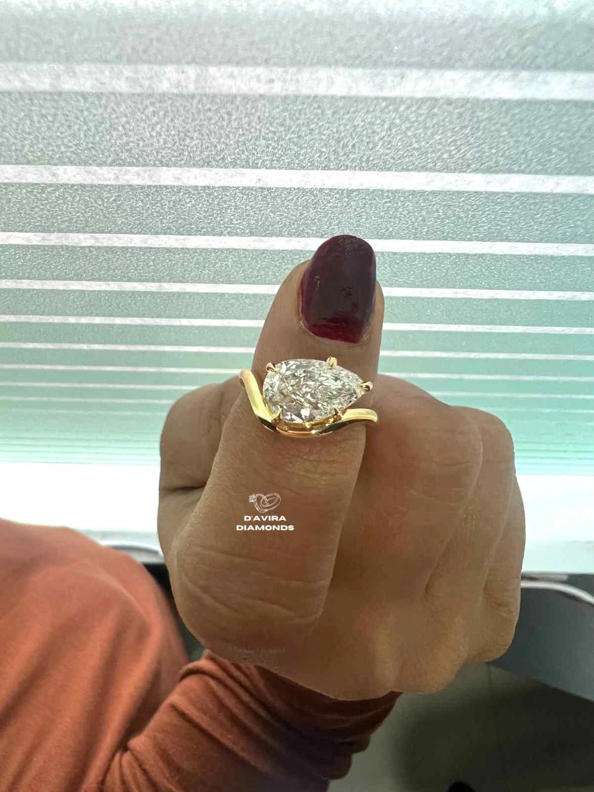 Pear Diamond Curved Solitaire Engagement Ring