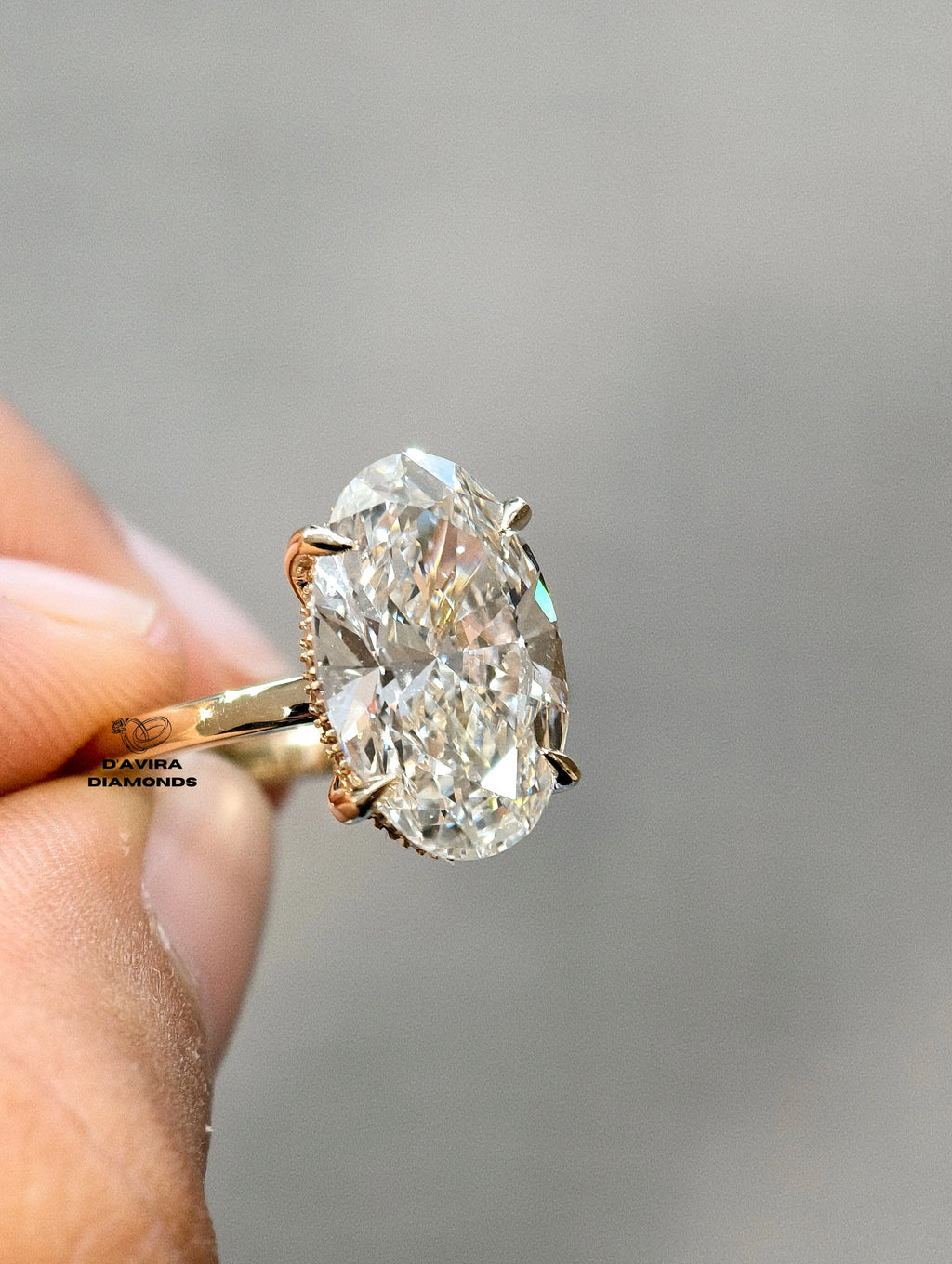 side view oval cut diamond solitaire engagement ring