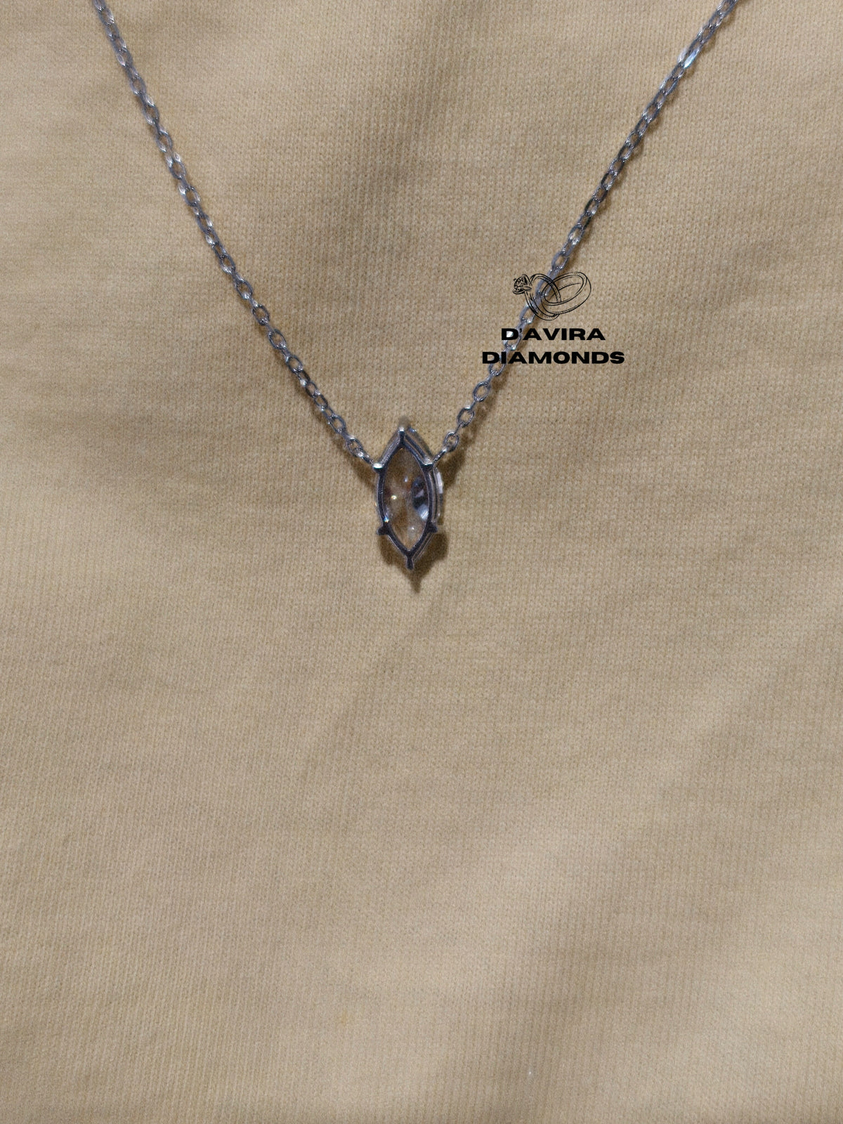 Marquise cut diamond pendant necklace on a silver chain 