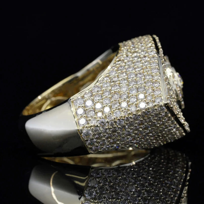 Side profile of a luxury men's diamond signet ring in yellow gold.