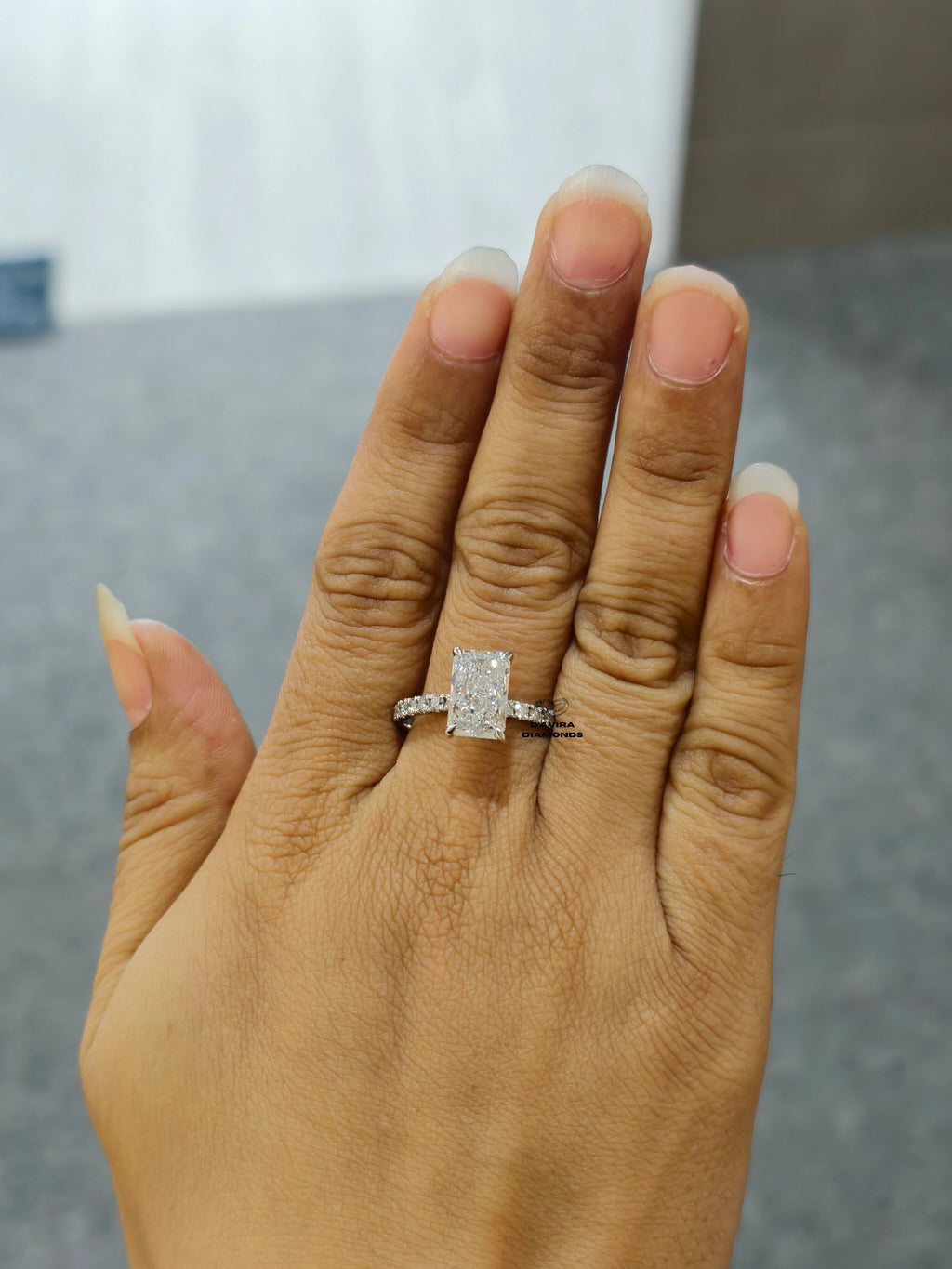 front view of the minimalist radiant cut lab diamond ring