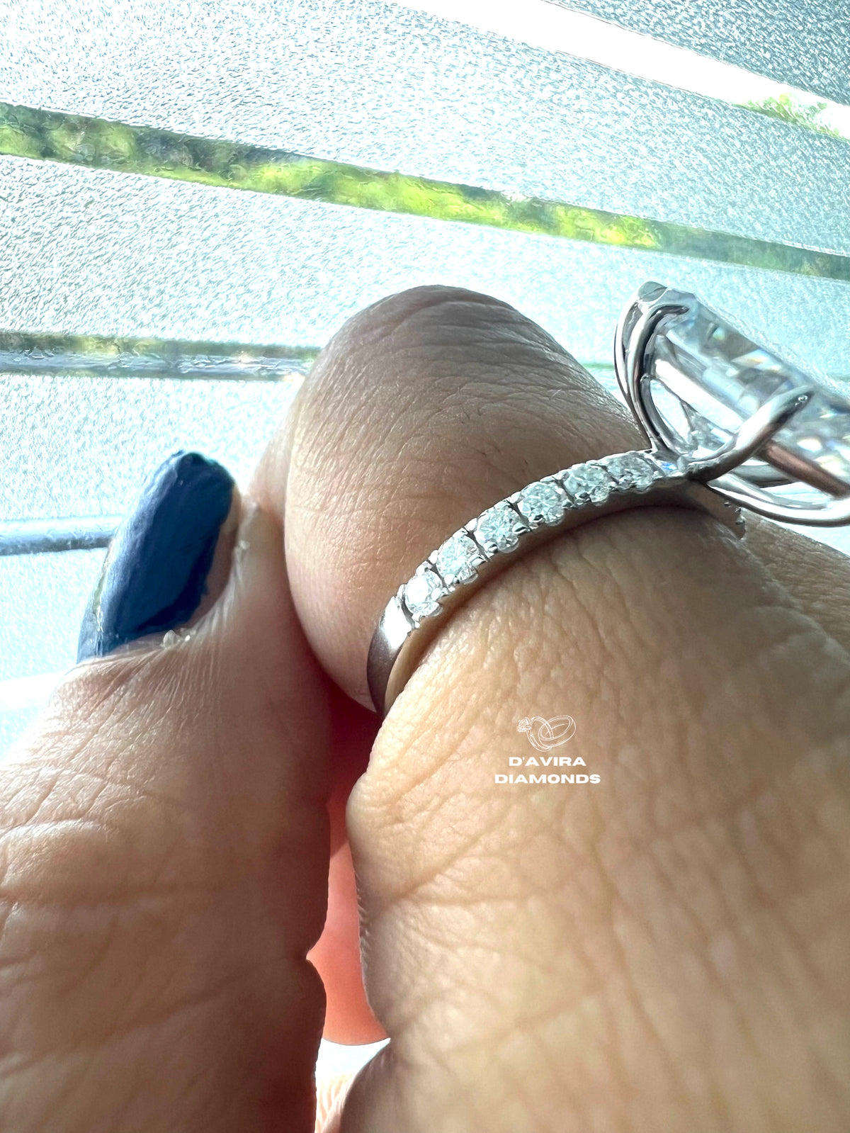 Side view of an marquise cut Engagement ring 