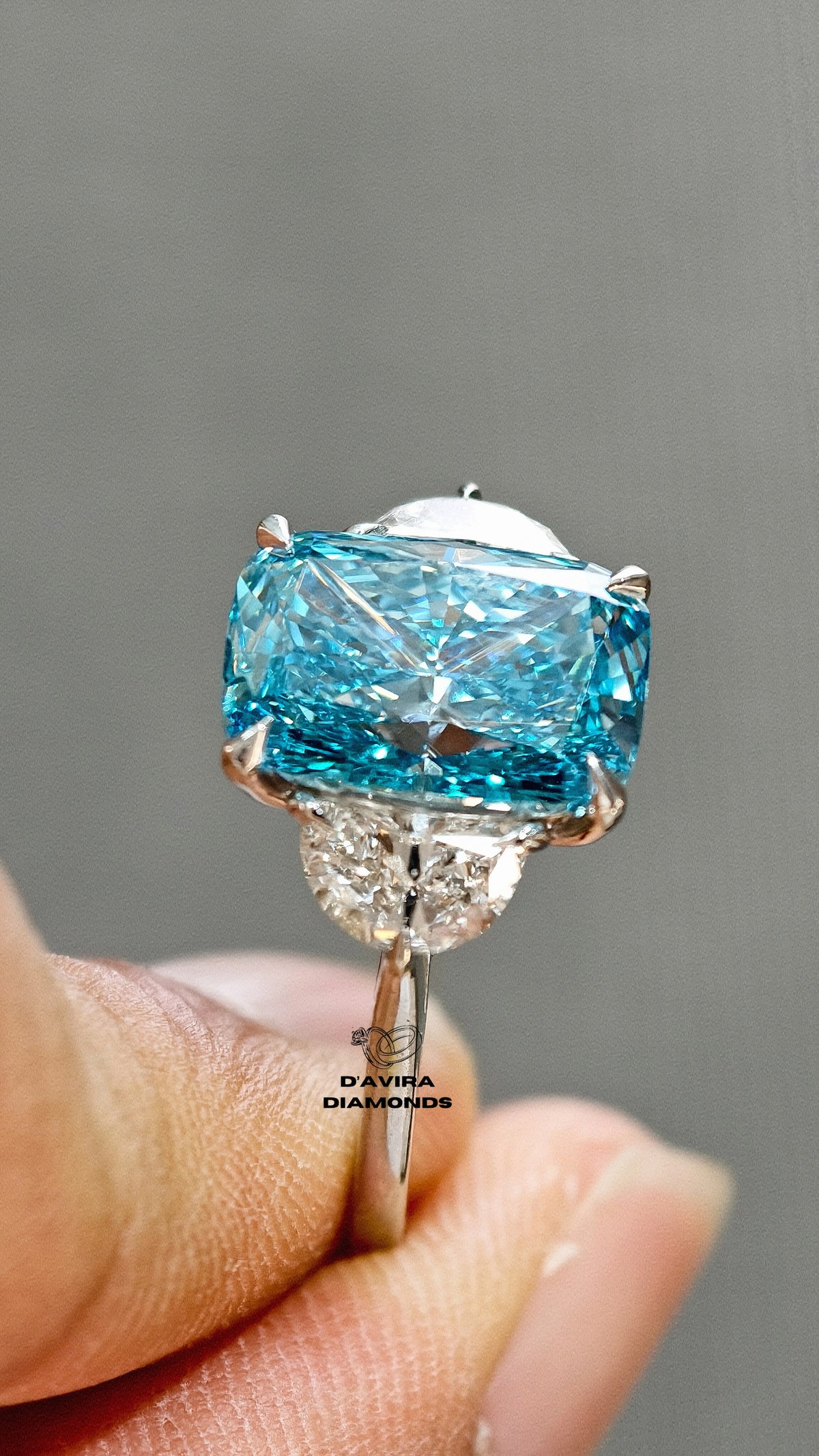 close up front view of the three stone lab grown diamond ring
