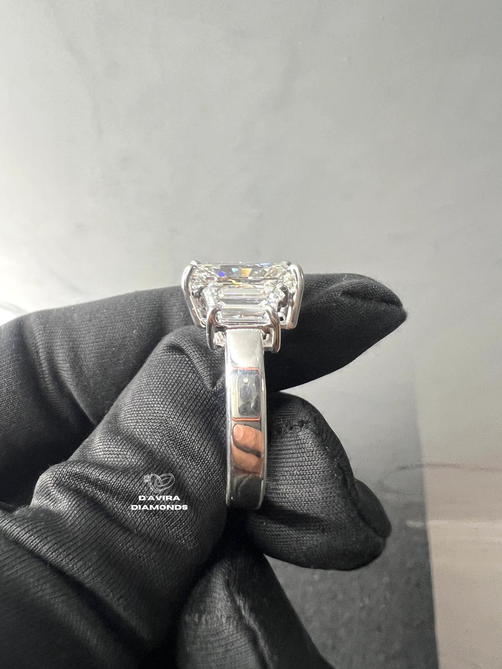 side view of the 3 stone emerald cut lab grown diamond ring