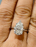 Pear-cut diamond ring with a classic solitaire on a white gold band