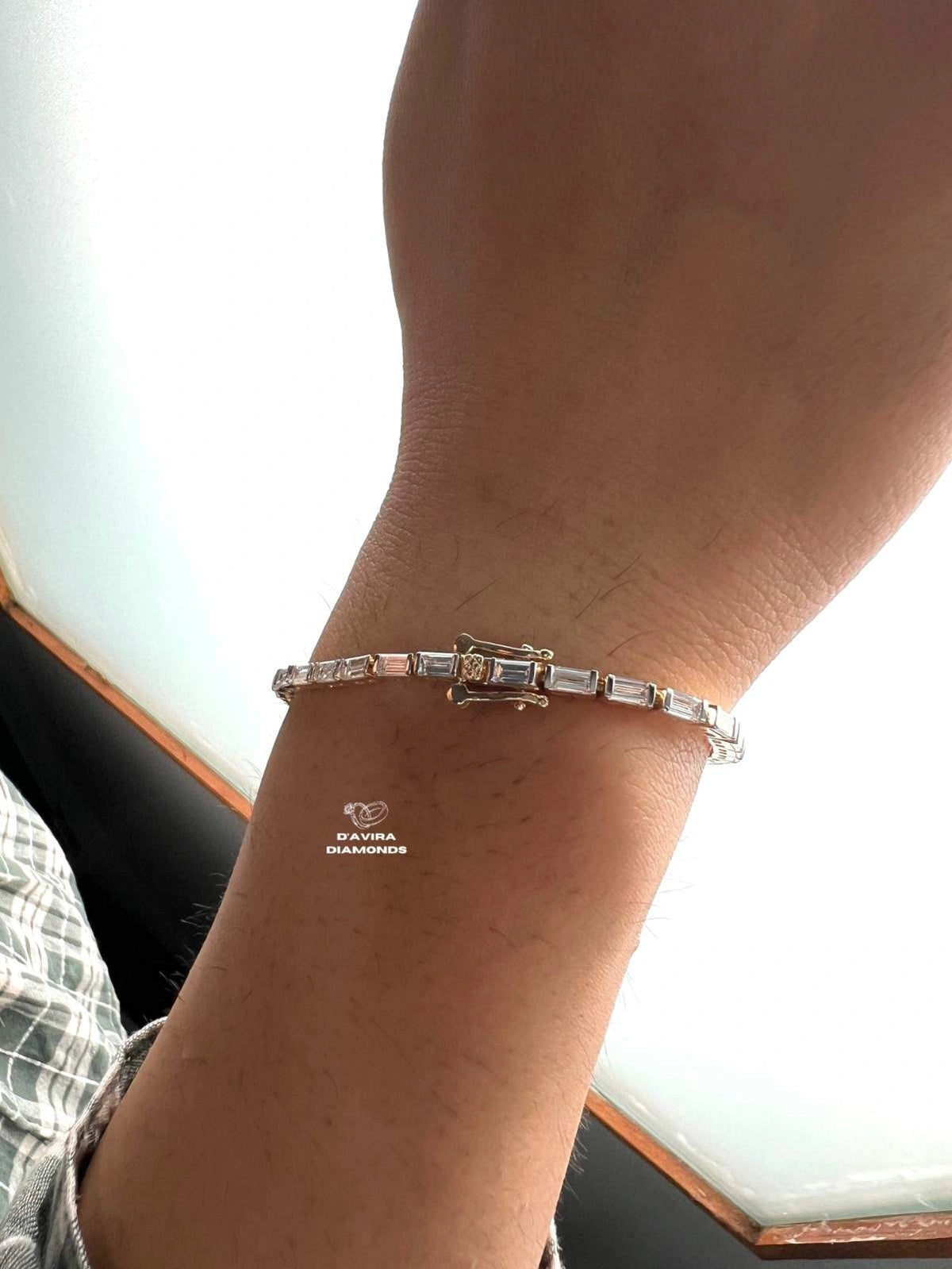 Clasp view of an emerald cut lab grown diamond tennis bracelet