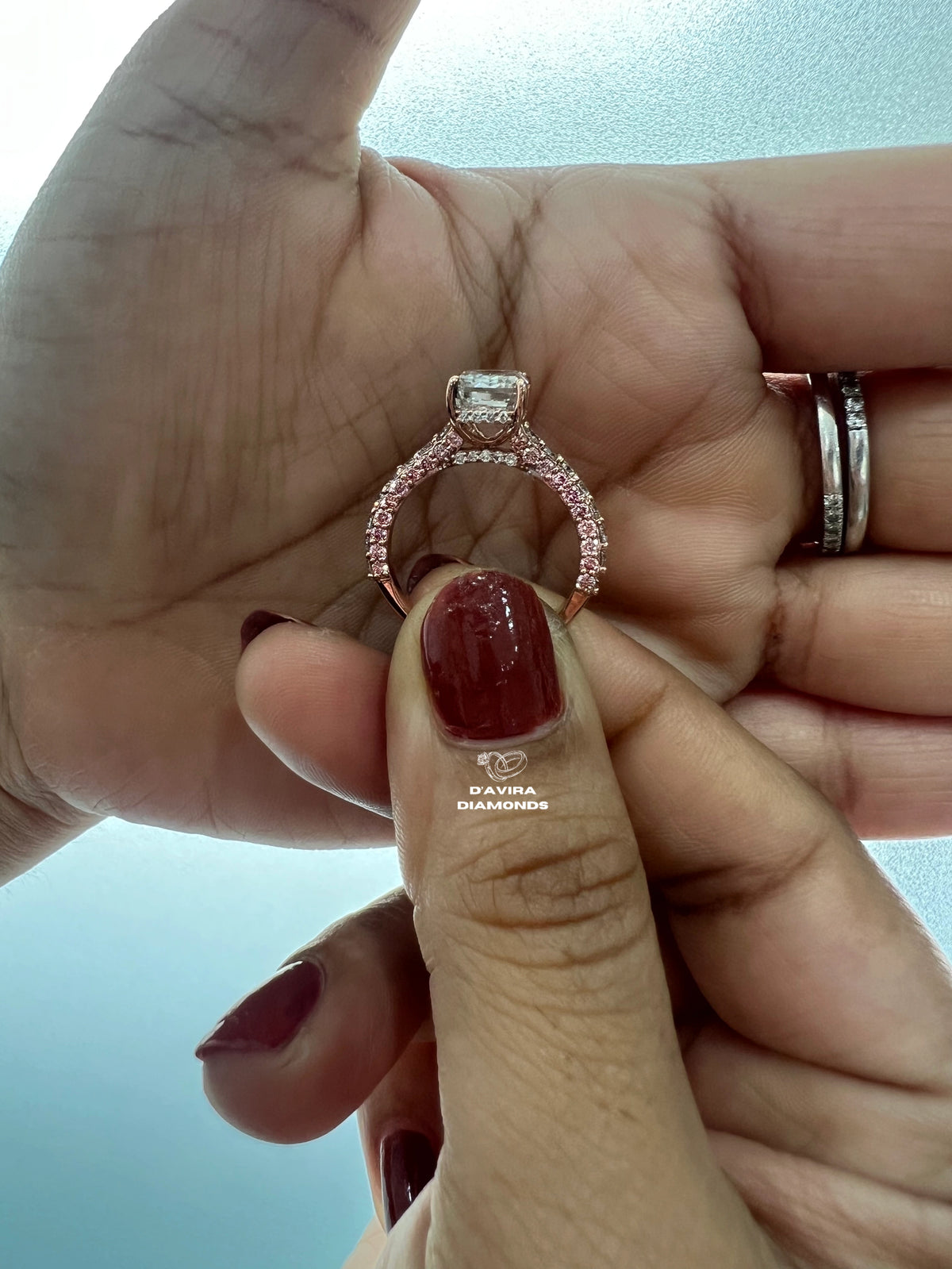 side view of the emerald cut hidden halo set lab diamond ring